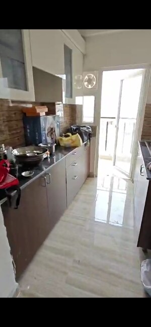 Kitchen in 3 BHK Apartment at Amrapali Terrace Homes, Tech Zone 4 Greater Noida – for Rent