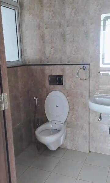 Bathroom in 3 BHK Apartment at Shapoorji Pallonji Joyville Phase 3, Sector 102 – for Rent
