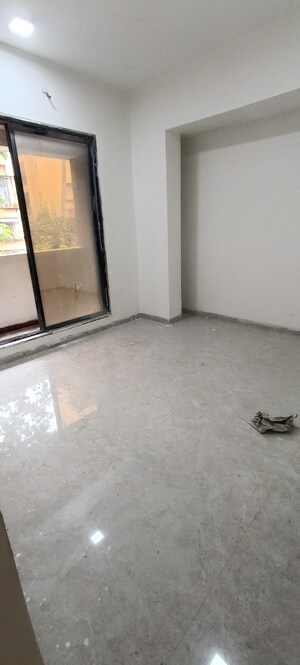 Room in 2 BHK Apartment at Seawoods – for Sale