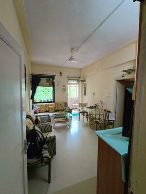 Living Room in 1 BHK Apartment at Vinod Villa Worli, Worli – for Rent