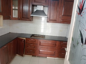 Kitchen in 4 BHK Apartment at JMD Gardens, Sector 33 – for Rent