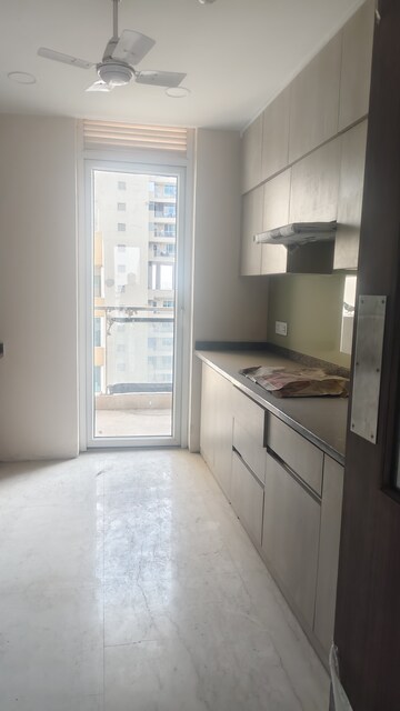 Kitchen in 3 BHK Apartment at Ambience Tiverton, Sector 50 – for Sale