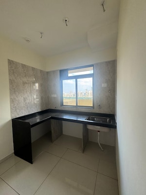 Kitchen in 2 BHK Apartment at Sheth Auris Bliss, Malad West – for Sale