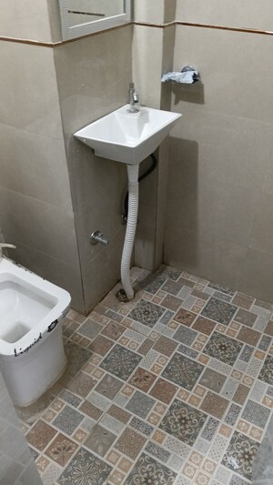 Bathroom in 1 RK Apartment at Unitech Uniworld Gardens, Sector 47 – for Rent