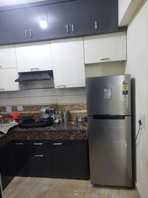 Kitchen in 3 BHK Apartment at ABA Coco County, Sector 10 Greater Noida – for Rent