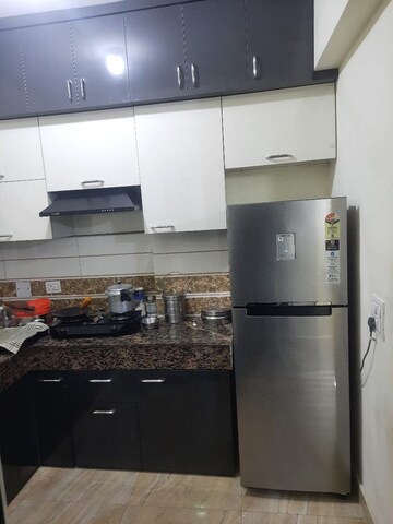 Kitchen in 3 BHK Apartment at ABA Coco County, Sector 10 Greater Noida – for Rent