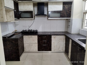 Kitchen in 3 BHK Apartment at ABA Coco County, Sector 10 Greater Noida – for Rent