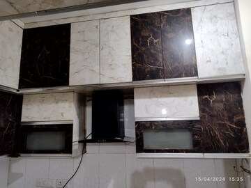 Kitchen in 3 BHK Apartment at ABA Coco County, Sector 10 Greater Noida – for Rent