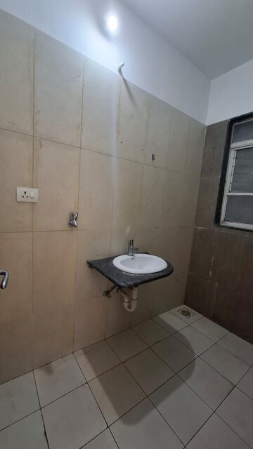 Bathroom in 1 BHK Apartment at Kolte Patil Life Republic Arezo, Hinjewadi – for Rent