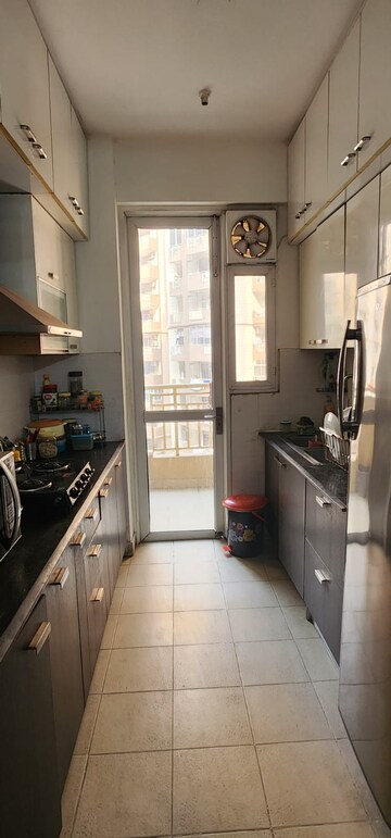 Kitchen in 3 BHK Apartment at Hawelia Valencia Homes, Sector 1 Greater Noida – for Rent