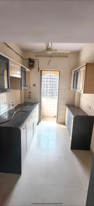 Kitchen in 2 BHK Apartment at Bhoomi Park, Malad West – for Rent