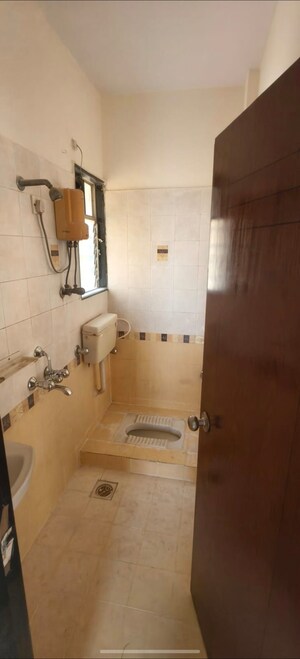 Bathroom in 2 BHK Apartment at Bhoomi Park, Malad West – for Rent