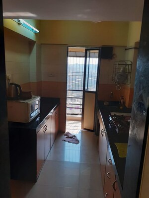 Kitchen in 2 BHK Apartment at K Raheja Vihar, Powai – for Rent