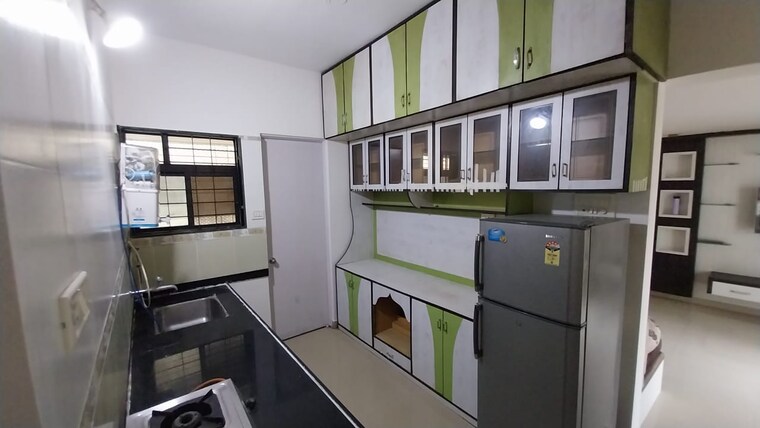 Kitchen, magarpatta-city-iris 2 Bedroom 800 Sq.Ft. Apartment In Hadapsar Pune 10163543