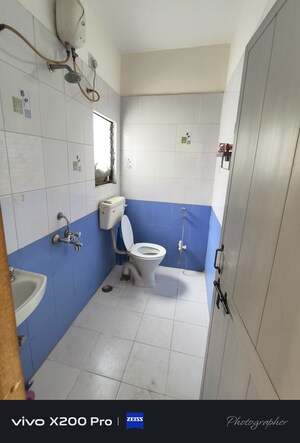 Bathroom in 2 BHK Apartment at Wadgaon Sheri – for Rent