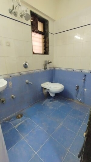 Bathroom in 2 BHK Apartment at Raj Rudram Apartments, Goregaon East – for Rent