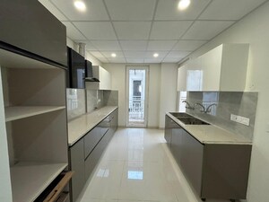 Kitchen in 3 BHK Apartment at The Ananta Aspire, Utrathiya – for Sale
