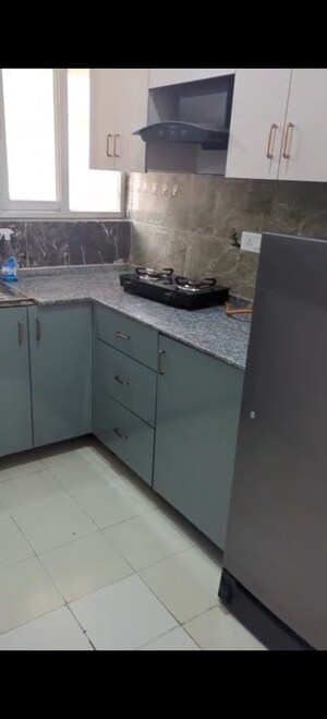 Kitchen in 3 BHK Apartment at Amrapali Riverview, Amrapali Leisure Valley – for Rent