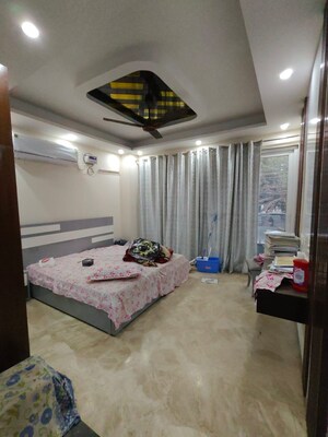 Bedroom in 4 BHK Builder Floor at Sushant Lok I – for Rent