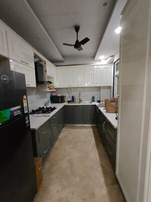 Kitchen in 4 BHK Builder Floor at Sushant Lok I – for Rent
