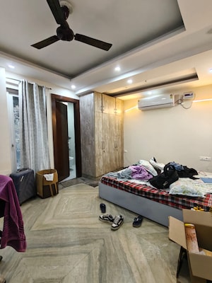 Bedroom in 4 BHK Builder Floor at Sushant Lok I – for Rent