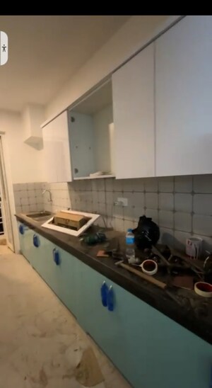 Kitchen in 2 BHK Apartment at Urban Axis Urban Woods, Sushant Golf City – for Rent