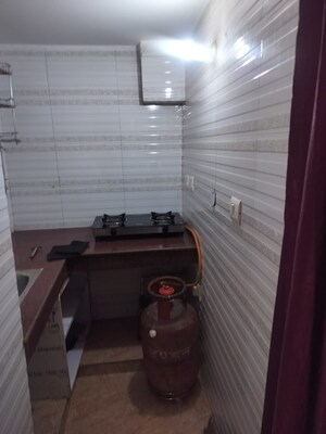 Kitchen in 1 RK Villa at RWA Apartments Sector 26, Sector 26 – for Rent