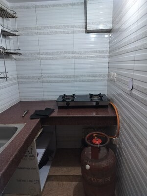 Kitchen in 1 RK Villa at RWA Apartments Sector 26, Sector 26 – for Rent