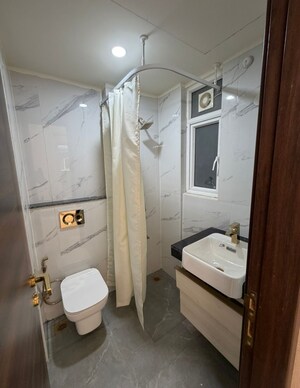 Bathroom in 2 BHK Apartment at Smart World Orchard, Sector 61 – for Rent