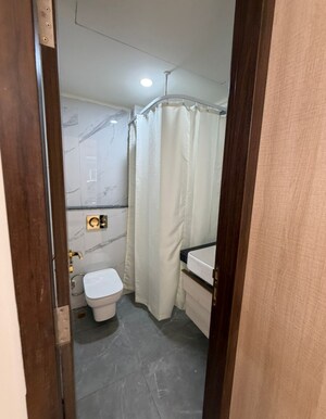 Bathroom in 2 BHK Apartment at Smart World Orchard, Sector 61 – for Rent