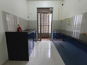 Kitchen in 2 BHK Apartment at Kalpataru Paramount, Kapur Bawdi – for Sale