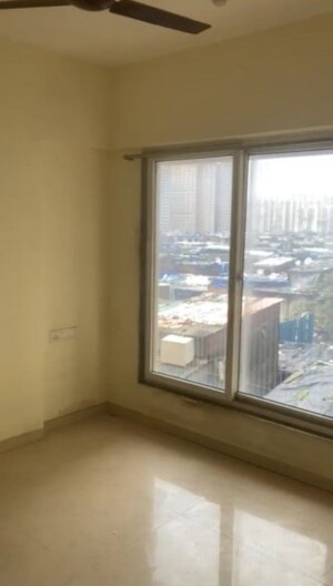 Room in 1 BHK Apartment at Ruparel Elara, Kandivali West – for Rent