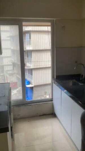 Kitchen in 1 BHK Apartment at Ruparel Elara, Kandivali West – for Rent