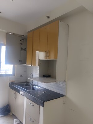 Kitchen in 2 BHK Apartment at Gulshan Bellina, Sector 16 Greater Noida – for Rent