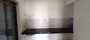 Kitchen in 2 BHK Apartment at Shapoorji Pallonji Joyville Celestia, Hadapsar – for Rent