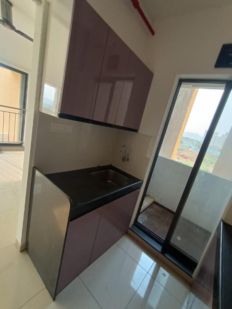 Kitchen, shapoorji-pallonji-joyville-celestia 2 Bedroom 920 Sq.Ft. Apartment In Hadapsar Pune 10186134