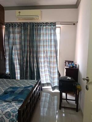 Bedroom in 2 BHK Apartment at Tharwani Heritage, Kharghar Sector 7 – for Rent
