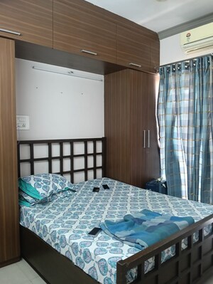 Bedroom in 2 BHK Apartment at Tharwani Heritage, Kharghar Sector 7 – for Rent