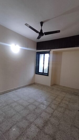 Room in 2 BHK Apartment at Arjun CHS Vasant Vihar, Vasant Vihar – for Rent
