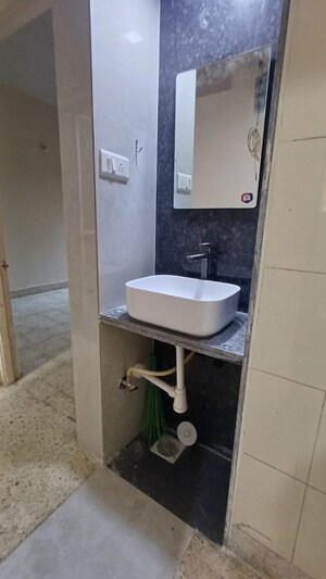 Bathroom in 2 BHK Apartment at Arjun CHS Vasant Vihar, Vasant Vihar – for Rent