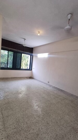 Living Room in 2 BHK Apartment at Arjun CHS Vasant Vihar, Vasant Vihar – for Rent