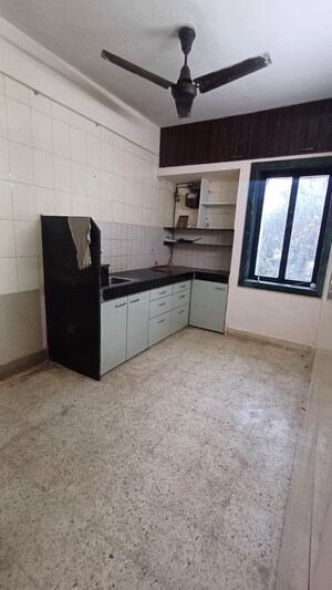 Kitchen in 2 BHK Apartment at Arjun CHS Vasant Vihar, Vasant Vihar – for Rent