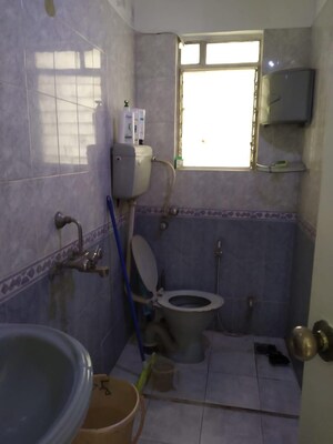 Bathroom in 3 BHK Apartment at Kusum Kunj, Prabhat Road – for Rent