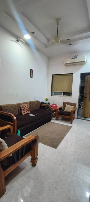 Living Room in 2 BHK Apartment at Mhada CHS, Vasant Vihar – for Rent