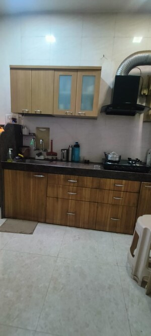 Kitchen in 2 BHK Apartment at Mhada CHS, Vasant Vihar – for Rent