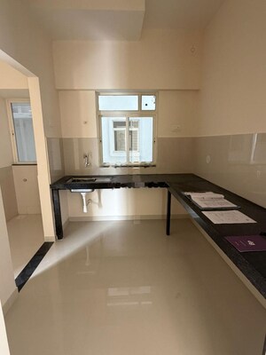 Kitchen in 1 BHK Apartment at Gera Adara, Hinjewadi – for Rent