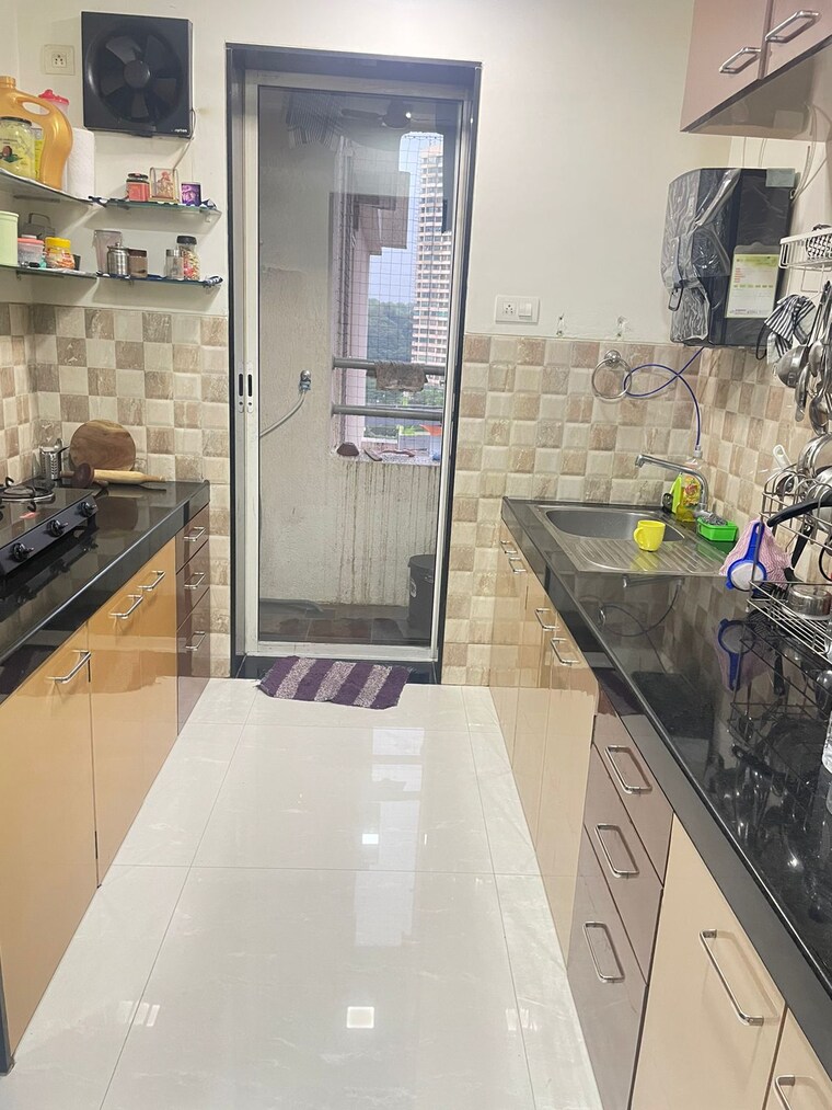 Kitchen, lily-white 3 Bedroom 1100 Sq.Ft. Apartment In Jogeshwari East Mumbai 10187563