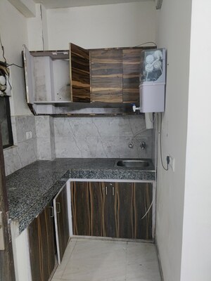 Kitchen in 2 BHK Builder Floor at Shobhabazar – for Sale