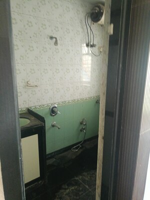 Bathroom in 3 BHK Apartment at Ratna Rajul CHS, Kandivali West – for Sale