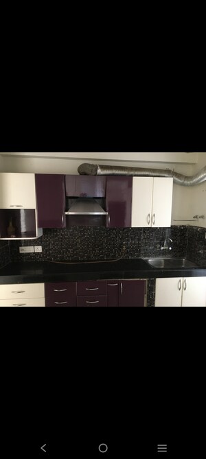 Kitchen in 2 BHK Apartment at Paramount Symphony, Sain Vihar – for Sale